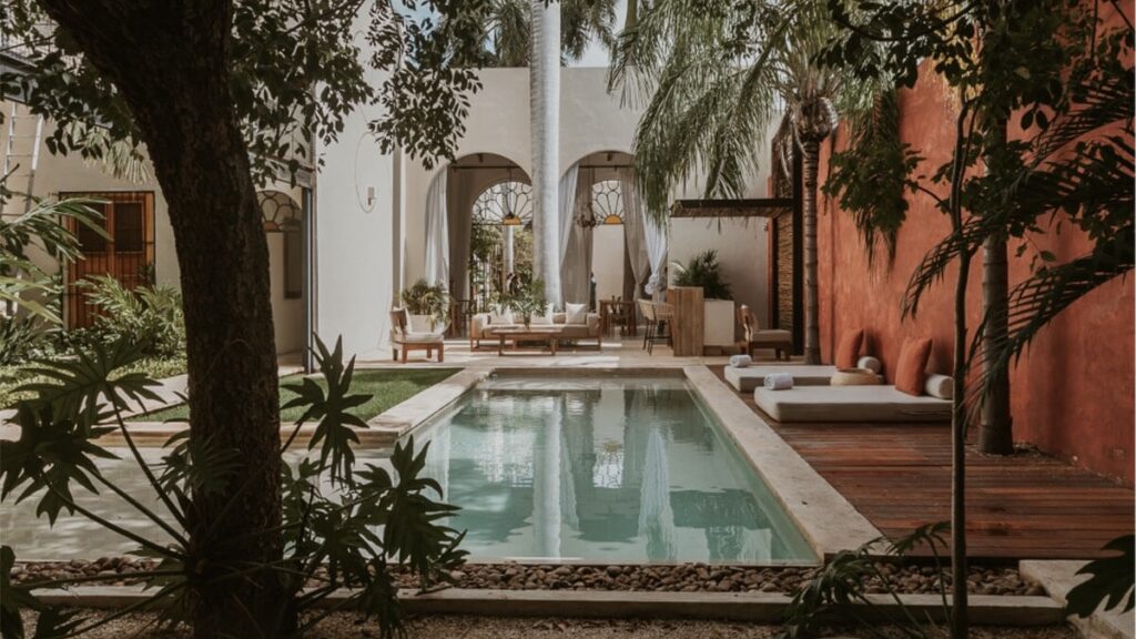 Casa de las Palomas by Paloma's Hotels swimming pool and lush courtyard
